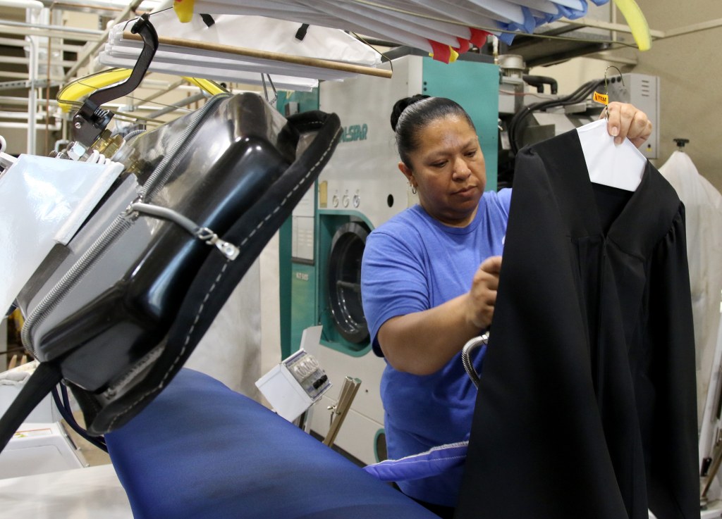 Picture of: Business offers free graduation gown cleaning